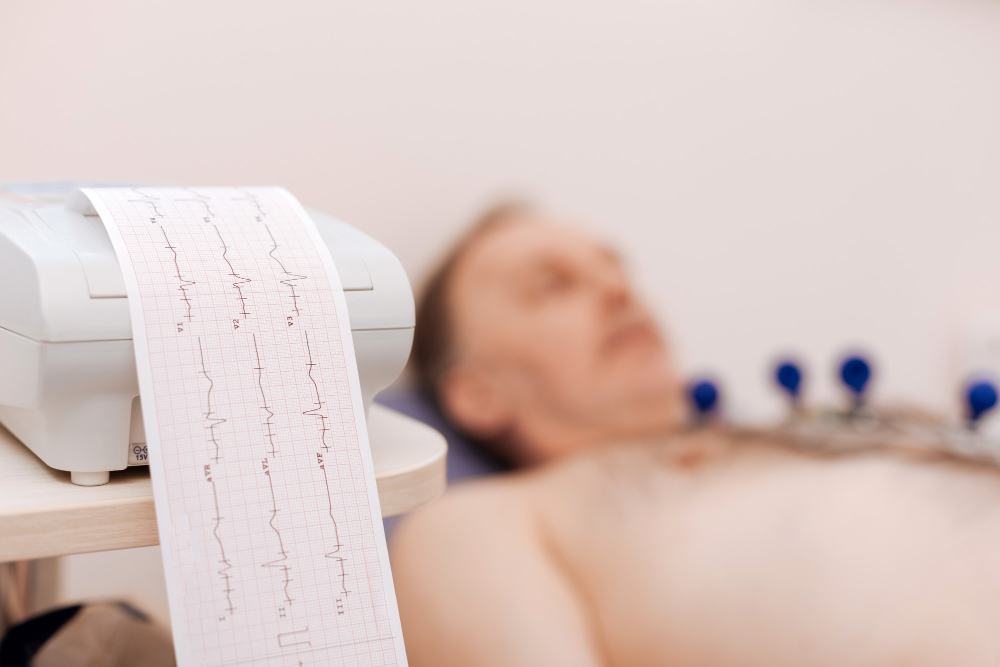 ECG printout beside a patient during a heart test